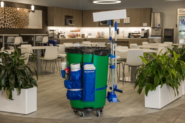 green Trash can with cleaning supplies attached 