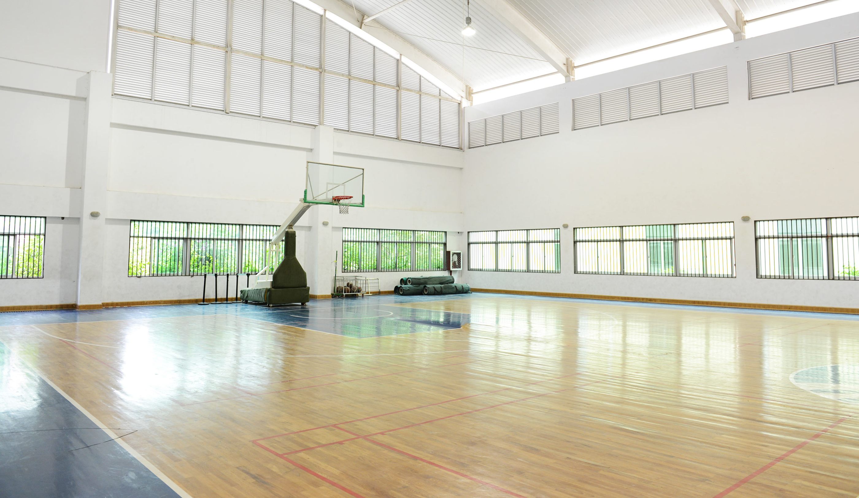 school gym with basketball hoop
